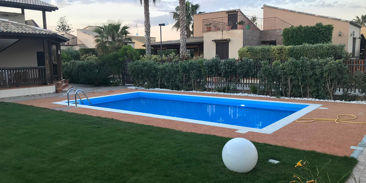 Progettazione e sistemazione piscina interrata esterna